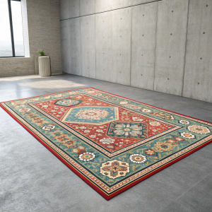Geometric and floral patterns of an oriental rug on a modern concrete floor. Studio photo