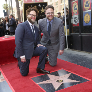 Seth Rogen and Kevin McCormack at the Hollywood Walk of Fame unveiling. Both in formal attire.