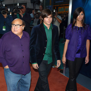 Danny DeVito, Zac Efron, and Angy attending the 'Dr. Seuss The Lorax' premiere. Red carpet event with flashing cameras.