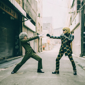 Fan art of Giorno Giovanna and Leone Abbacchio from JoJo's Bizarre Adventure: Golden Wind. High contrast, dynamic action pose, dark urban alley background