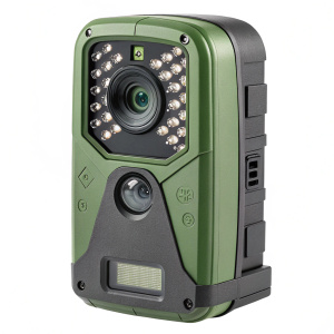 Handheld rugged camera Primos Truth Cam 35. Compact design, ideal for outdoor adventures. Features green and grey hues, equipped with camera lens, LED flash array, and a small display window for versatile photography needs in different lighting conditions.