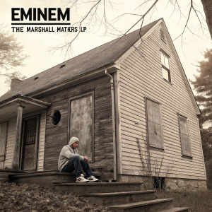 Album cover for Eminem's 'The Marshall Mathers LP'. Sepia-toned image with a weathered house and wooden exterior. Eminem sits on the porch steps, looking relaxed. Border frame and explicit content warning