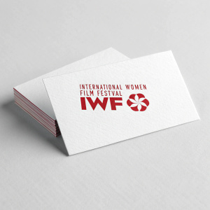 Modern and sleek business cards for the International Women Film Festival (IWFF). White cardstock, bold red text and logo.