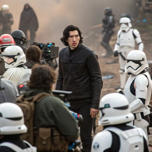 Adam Driver amidst a crowd of stormtroopers on the set of Star Wars. Intense action scene with chaotic background.