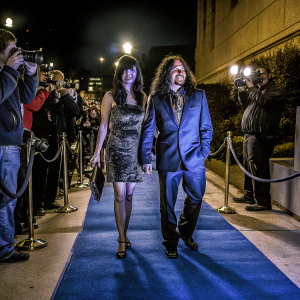 Krysten Ritter and Adam Granduciel at the premiere event. Red carpet, paparazzi flashes