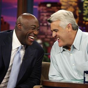 Michael Clarke Duncan and Jay Leno, laughing together on The Tonight Show set at NBC Studios. Informal, candid moment