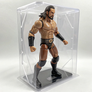 Professional wrestler Drew McIntyre action figure inside a clear plastic display. Detailed figure with muscular build and intense expression