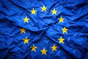 Flag of Europe, top view on a wrinkled European Union blue flag, concept of issue, problem, difficulty and crisis in Euro zone