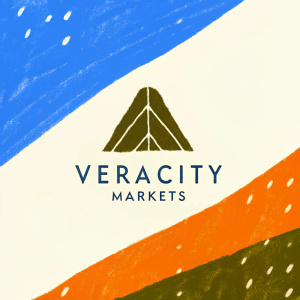 Modern logo for Veracity Markets featuring a sleek, geometric shape in the center with the company name in bold, minimalist text. The design palette includes shades of blue, red, and grayscale, creating a clean and contemporary look.