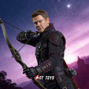 A detailed Hot Toys action figure of Clint Barton, aka Hawkeye, from Avengers: Age of Ultron. Dressed in dark, authentic replica attire. Determined expression. Meticulously detailed bow and arrow. Against a backdrop of glittering, celestial purple, with Marvel and Hot Toys logos prominently displayed.