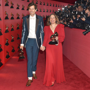 Mark Ronson and Samantha Ronson, posing at the Grammy Awards. Black tie event with red carpet