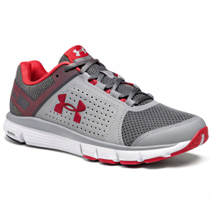 Under Armour Strive 6, cross training shoe featuring a stylish gray and red color scheme. The shoe boasts a mesh upper and prominent logo on the side, ideal for both athletic performance and casual wear.