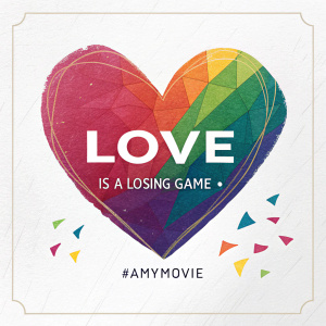 A digital graphic of a heart with the text 'LOVE' and '#AMYMOVIE'. Below 'LOVE', the phrase 'Is a Losing Game' is written.