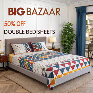 Advertisement for Big Bazaar featuring a stylish bedroom set. Modern bed with a vibrant, geometric-patterned bedspread and coordinating pillows. 50% off on double bed sheets. Limited time offer. Visit nearest Big Bazaar store.
