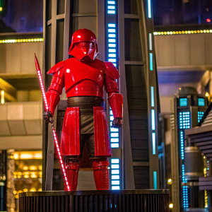 Star Wars action figure, red Praetorian Guard, detailed armor design, black display base