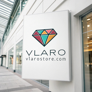 A sleek logo design for 'VLARO', featuring a geometric diamond shape in vibrant colors, set against a crisp white background, with the URL 'vlarostore.com' beneath.