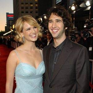January Jones and Josh Groban at the 2005 AFI Fest, both grinning for the cameras on a bustling red carpet.