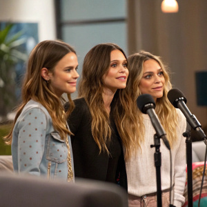 Rachel Bilson and the Olsen twins in a studio setting. Candid picture. Microphones and couch in blurred background