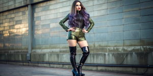 Long hair with dark purple ombre highlights Tattoo Gothic makeup in olive green Sky blue patent leather super short hot pants Dark green patent leather over-the-knee high-heeled zip-up boots
