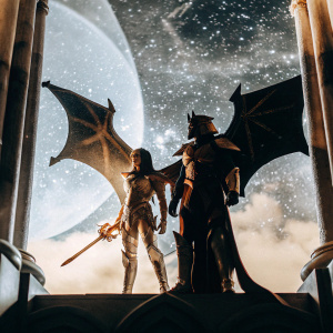 Aatrox from League of Legends, alongside another character, in a dramatic pose. Cosmic backdrop with swirling stars and nebulae