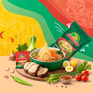 Digital ad for Indomie instant noodles. Vibrant background with abstract shapes and bright colors. Prominent green packaging of Indomie noodles and ingredients