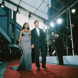 Serena Williams and Cristiano Ronaldo at the ESPY Awards. Both in elegant formal wear. Sponsored by major brands.