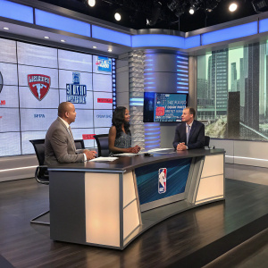 ESPN analysts Jay Bilas, Cari Champion, and Adrian Wojnarowski discussing the NBA Draft Combine. Modern studio setup with large screens and graphic overlays