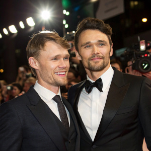 Scott Haze and James Franco attending a star-studded premiere. Crowd and photographers in the background.