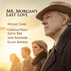 Michael Caine in 'Mr. Morgan's Last Love'. Movie poster featuring Clemence Poésy, Justin Kirk, Jane Alexander, and Gillian Anderson. Warm, sepia-toned colors with soft golden glow.