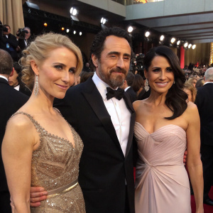 Photograph at the star-studded gala. Demian Bichir, Stefanie Sherk, and Maricruz Najera posing together. Formal attire and sea of faces in background.
