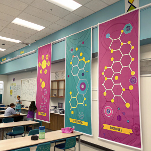 Molecular structure illustrations. Colorful banners with dominant shades of pink, purple, and teal, highlighted by bright yellow accents. Classroom science display.