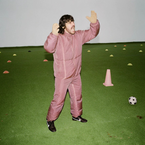 Gennaro Gattuso, intense expression, gesturing passionately. Training ground, green field.