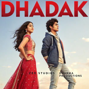 Movie poster showcasing Jahnvi Kapoor and Ishaan Khattar from 'Dhadak'. Presented by Zee Studios and Dharma Productions.