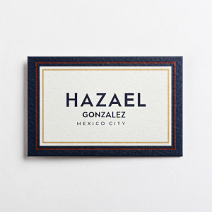 Business card for artist Hazael Gonzalez, living in vibrant Mexico City. Dark edges frame clean white background. Displays Hazael's name, phone, and email with sleek, professional design.