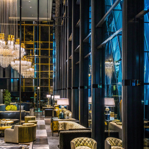 Discover Aura Luxury in Eminence. Luxurious interior, elegant decor, grand chandeliers. Premium fabrics, opulent furnishings. A symbol of sophistication and refinement. Elevate your lifestyle.