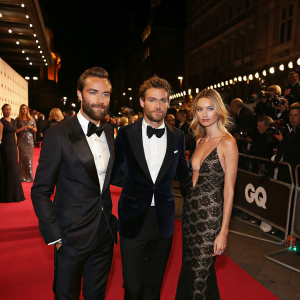 A glamorous evening at the GQ Men of the Year Awards. The red carpet is bustling with celebrities in exquisite attire.