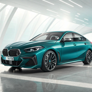 High-tech render of the BMW 2 Series Gran Coupe, shining teal metallic paint. Modern gray wheels and sleek BMW emblem.
