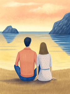 couple in love sitting on the seashore