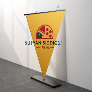 Triangular banner for film production company Sufyan Siddiqui Films. Vibrant colors on a plain white wall.
