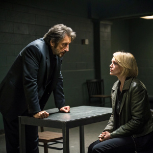 Al Pacino and Ellen Barkin during an intense interrogation scene from 'Sea of Love'. Dark, gritty backdrop with dim lighting.