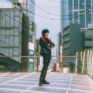 In a bustling cyberpunk cityscape, an anime character, Akira, stands on a neon-lit rooftop. Akira, wearing a sleek, black jacket with vibrant red accents, poses confidently with arms crossed. A futuristic skyline and swirling neon lights create a dynamic background.