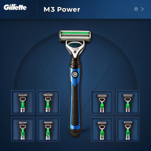 Homepage of Gillette.com showcasing M3 Power razors. Sleek design, dark blue background. Prominent Gillette branding at top. Main banner highlights patented technologies and benefits. Grid layout featuring various Gillette products in green and blue colors.