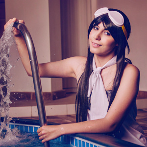 Haruka Nanase from Free!, long black hair, cute face, swimming cap. Blue pool background, water splashing