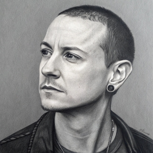Realistic graphite drawing of Chester Bennington. The artwork focuses on the subtle nuances of his facial features. Gray background.