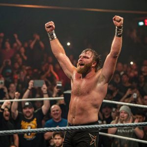 Jon Moxley, a wrestler with a beard, celebrates victory on the wrestling ring. The crowd is cheering loudly.