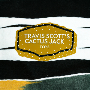Travis Scott's Cactus Jack Toys logo, sleek design on a white background, modern font with small details beneath in contrasting colors.