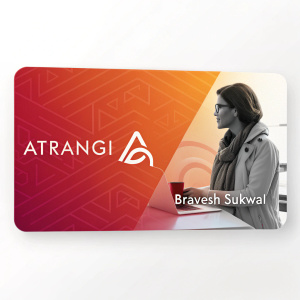 Bravesh Sukwal's sleek digital business card. Vibrant gradient background with hues of orange and red. Name 'ATRANGI' on the left, contact details on the right.