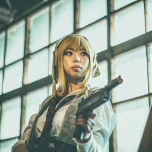Digital artwork featuring Shinohara Kotori. She has blonde hair, wearing a casual and combat-styled outfit. Focused expression, detailed facial features. Set against a digital backdrop.