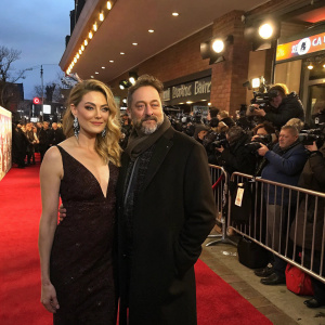 Mädchen Amick and David Alexis at the Sundance Film Festival premiere. Red carpet with bustling crowd and cameras flashing