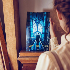 Cover art for 'Arm of the Sphinx' by Josiah Bancroft. Futuristic steampunk theme with blue hues and intricate architectural details. Fantasy novel